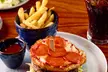 Enjoy a Delicious Meal and a Drink for Two at Social Pub and Kitchen | 120 Locations Nationwide (Up to 47% Off) - Second Medium