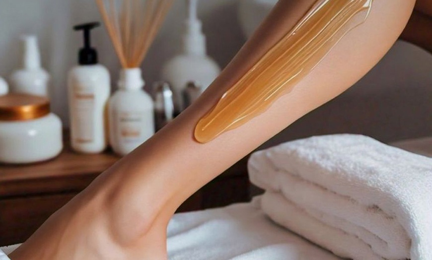 Image 1: Smooth Skin with Waxing Services on Full Arms, Full Legs, & More