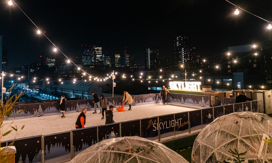 Image 3: Rooftop Ice Skating with meal, Raclette or Cocktails