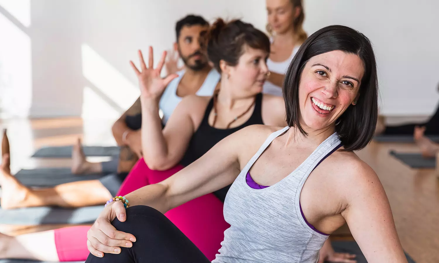 One Month of Unlimited Yoga or 10 Drop-In Yoga Classes at Modo Yoga (Up to 78% Off) - Primary Image