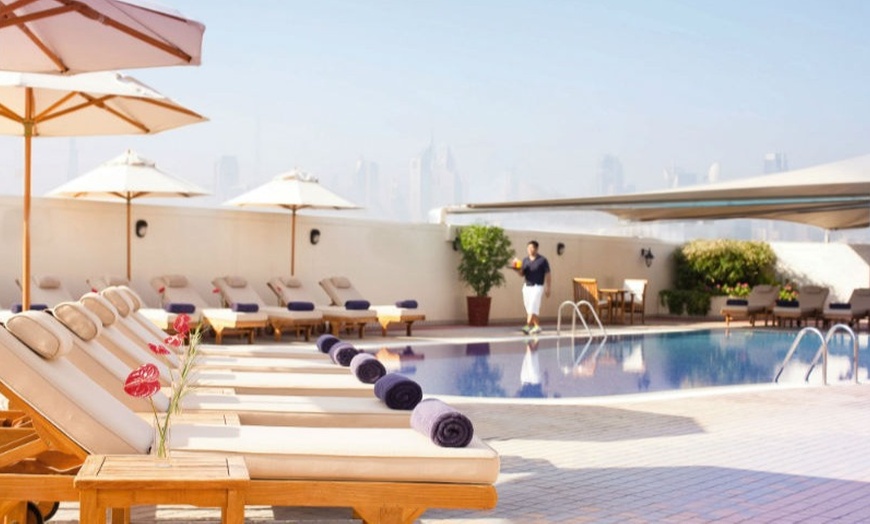 Image 2: 5* Pool Access with Food Credit: Child AED 39, Adult AED 69