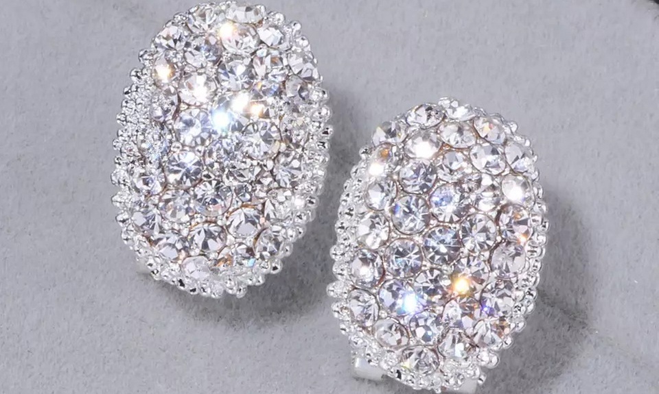 Experience Briboutiquee's elegant crystal pendant necklace and earrings set with sterling silver, now up to 85% off