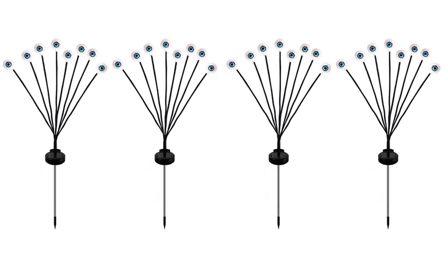 Image 8: Two or Four Packs of Solar Eyeball-Themed Outdoor Lights