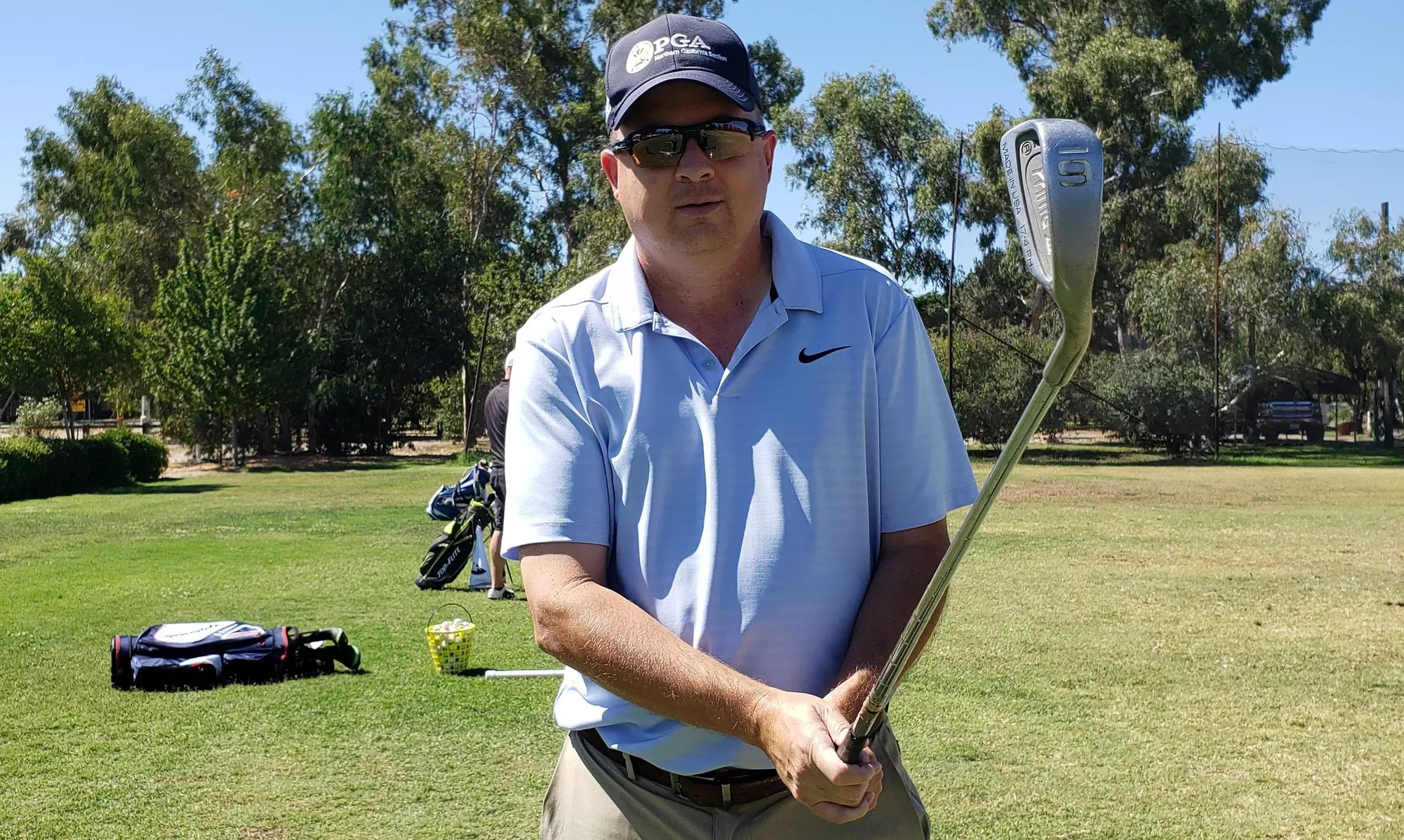 Enhance your skills with a golf lesson from Lance Johnson, a PGA professional, including range balls for up to 46% off - Primary Image