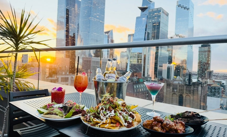 Image 1: 2 House Cocktails and 1 Appetizer for One, Two, or Four People 