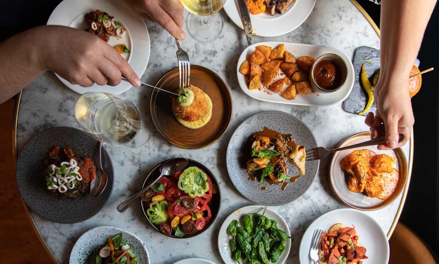 Image 1: Savor a Head Chef’s Tasting Menu with a Glass of Fizz for One or Two