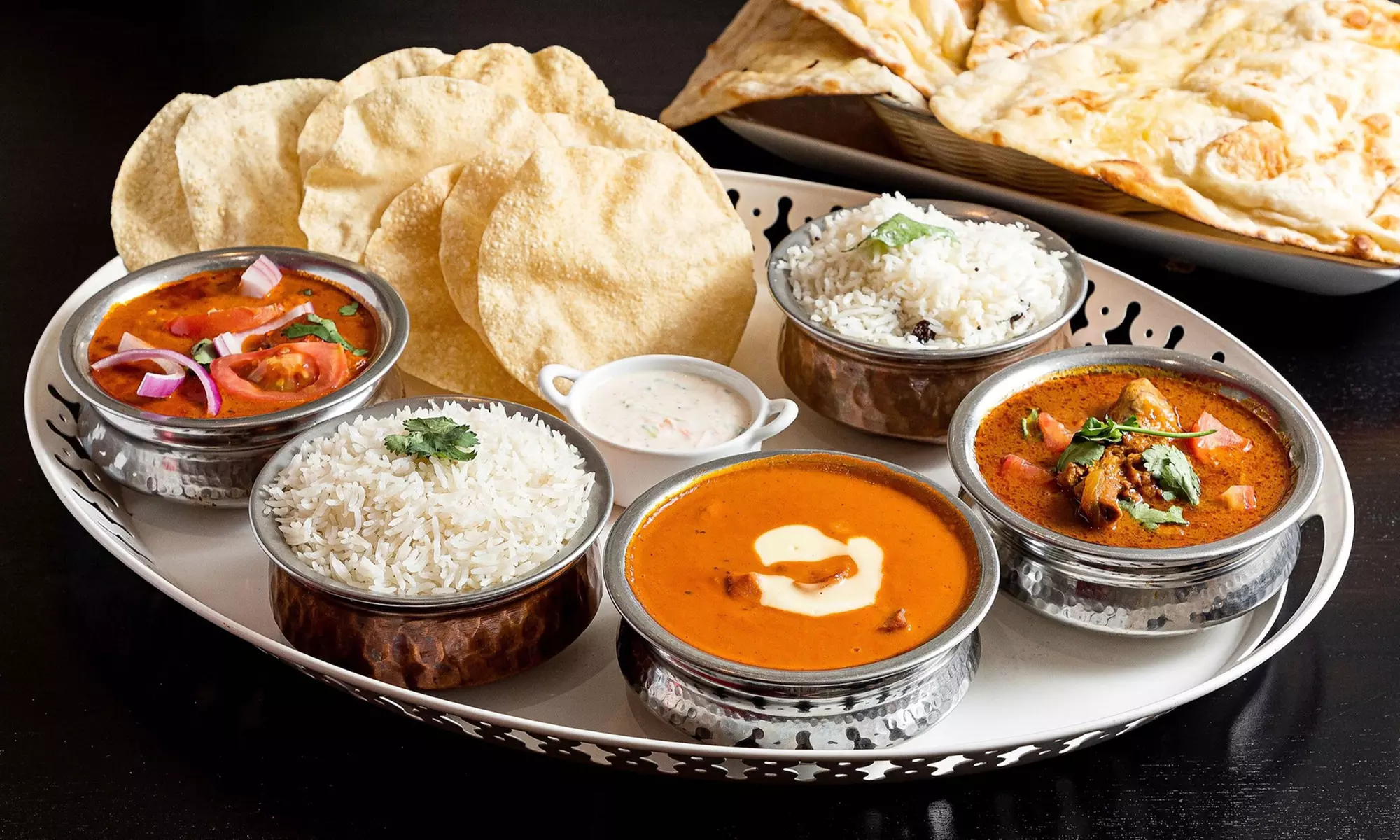 Indian dinner for two or four with appetizers and curry delights