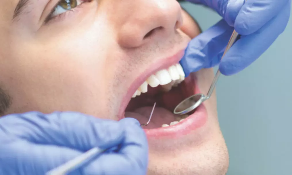 Checkup, Scale, and Polish or Teeth Whitening with In-Home Trays