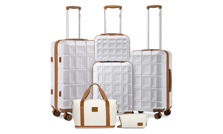 Image 6: Four Pack of PP Hard Shell Suitcases with a Travel Bag