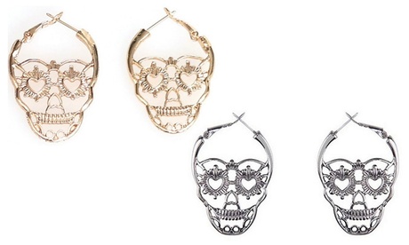 1 ou 2 boucles d'oreilles crâne