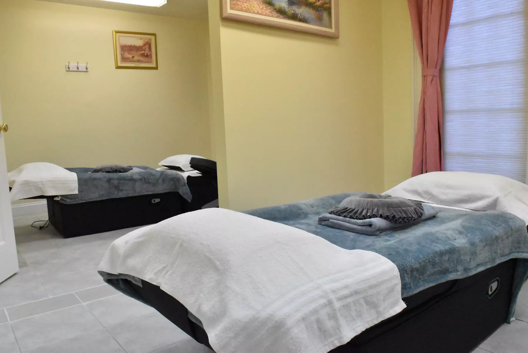 Unwind with 60 or 90-Minute Deep Tissue Bodywork w/ Optional Hot Stones at Sunshine Lily Spa - Primary Image