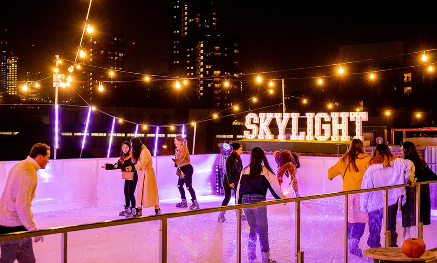 Image 4: Rooftop Ice Skating with meal, Raclette or Cocktails