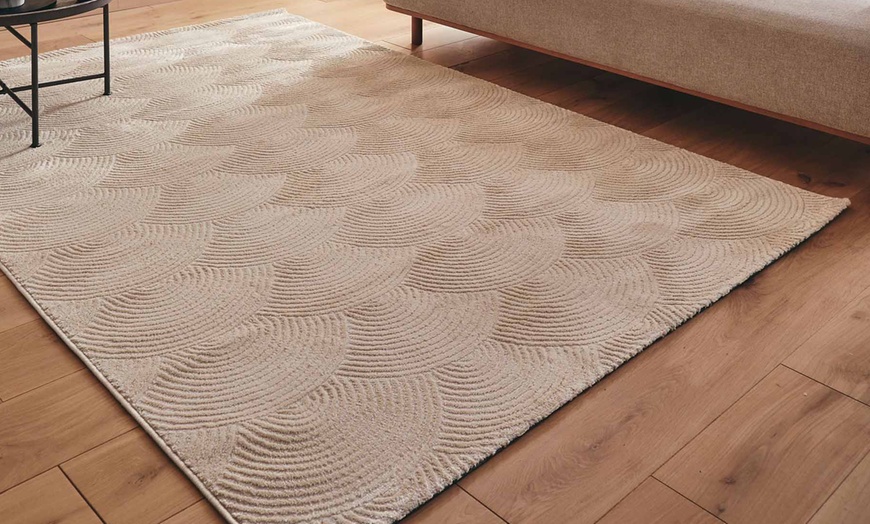 Image 26: Tapis à relief clair avec un design Art Déco