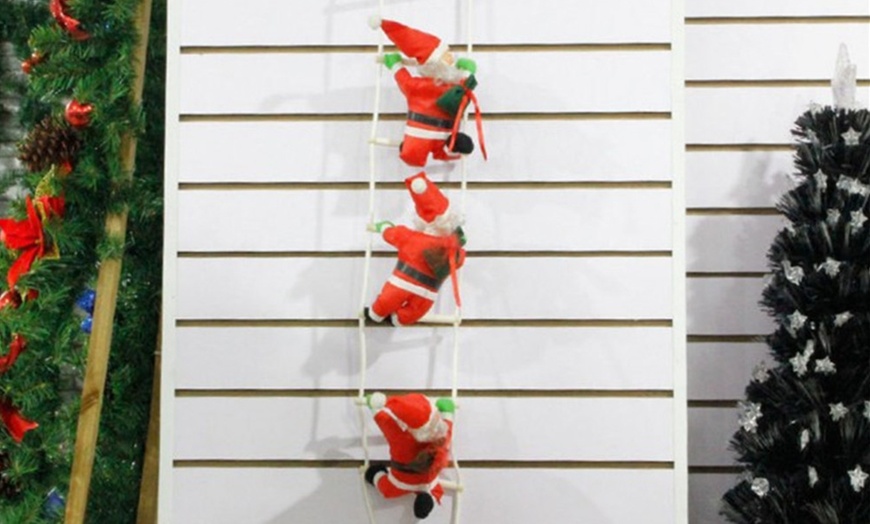 Image 3: Climbing Santa Decoration