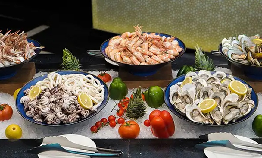 Image 1: Seafood Night Buffet at The Market Place at 5* Marriot Hotel Al Jadaff