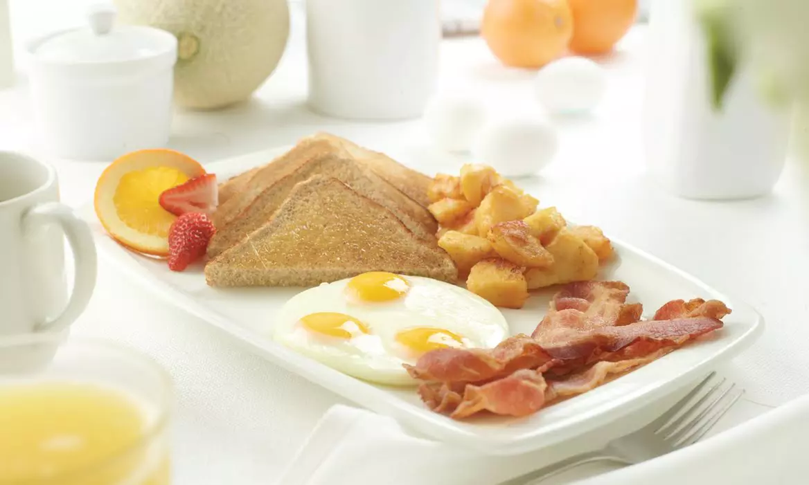 Breakfast and Lunch Cuisine at Eggsmart Restaurant (Up to 40% Off) - Primary Image