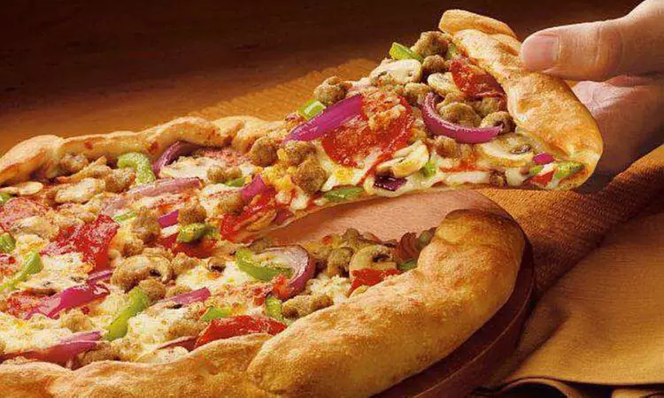 $25 or $50 Worth of Food at Pizza Bite (Up to 40% Off) - Primary Image