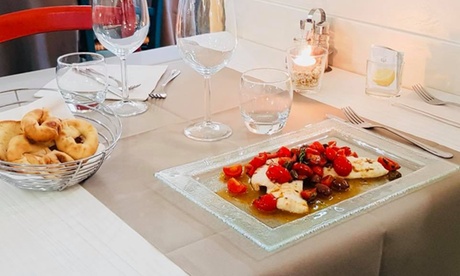 Menu di pesce e bottiglia di vino per 2 persone al ristorante Pescato E Mangiato (sconto fino a 39%)