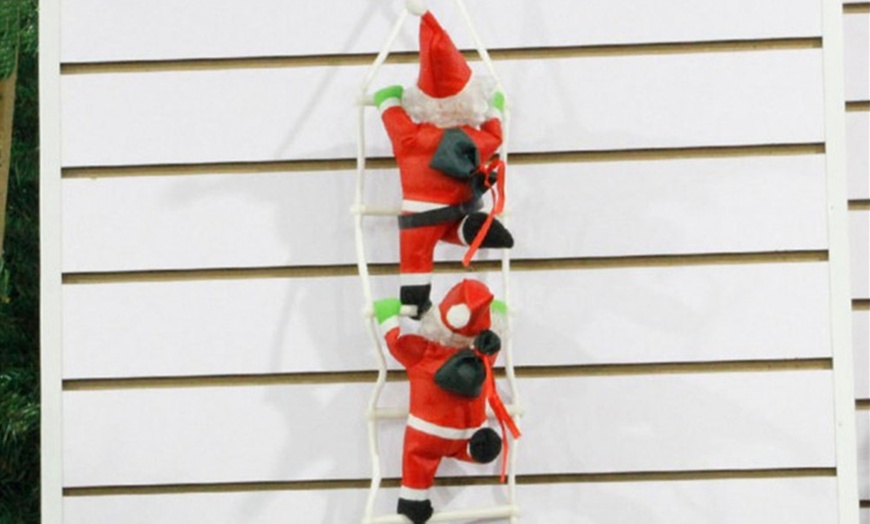 Image 1: Climbing Santa Decoration