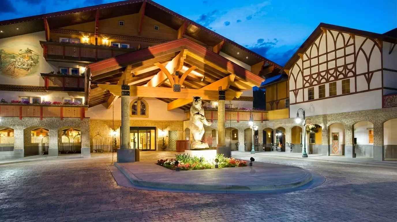 Cozy alpine rooms, heated pool, and mountain views