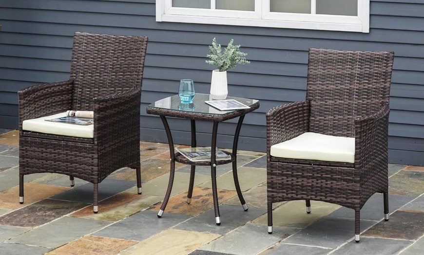 Image 1: Outsunny Three-Piece Outdoor Rattan-Effect Bistro Set 