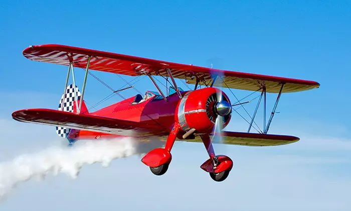 Scenic Flight in a Vintage Stearman Plane for One or Two from Outlaw Airshows (Up to 27% Off) - Primary Image