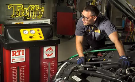 Two Oil Changes, Oil-Change Package, or Tire-Care Package at Tuffy Auto Service Center (Up to 71% Off) - Primary Image