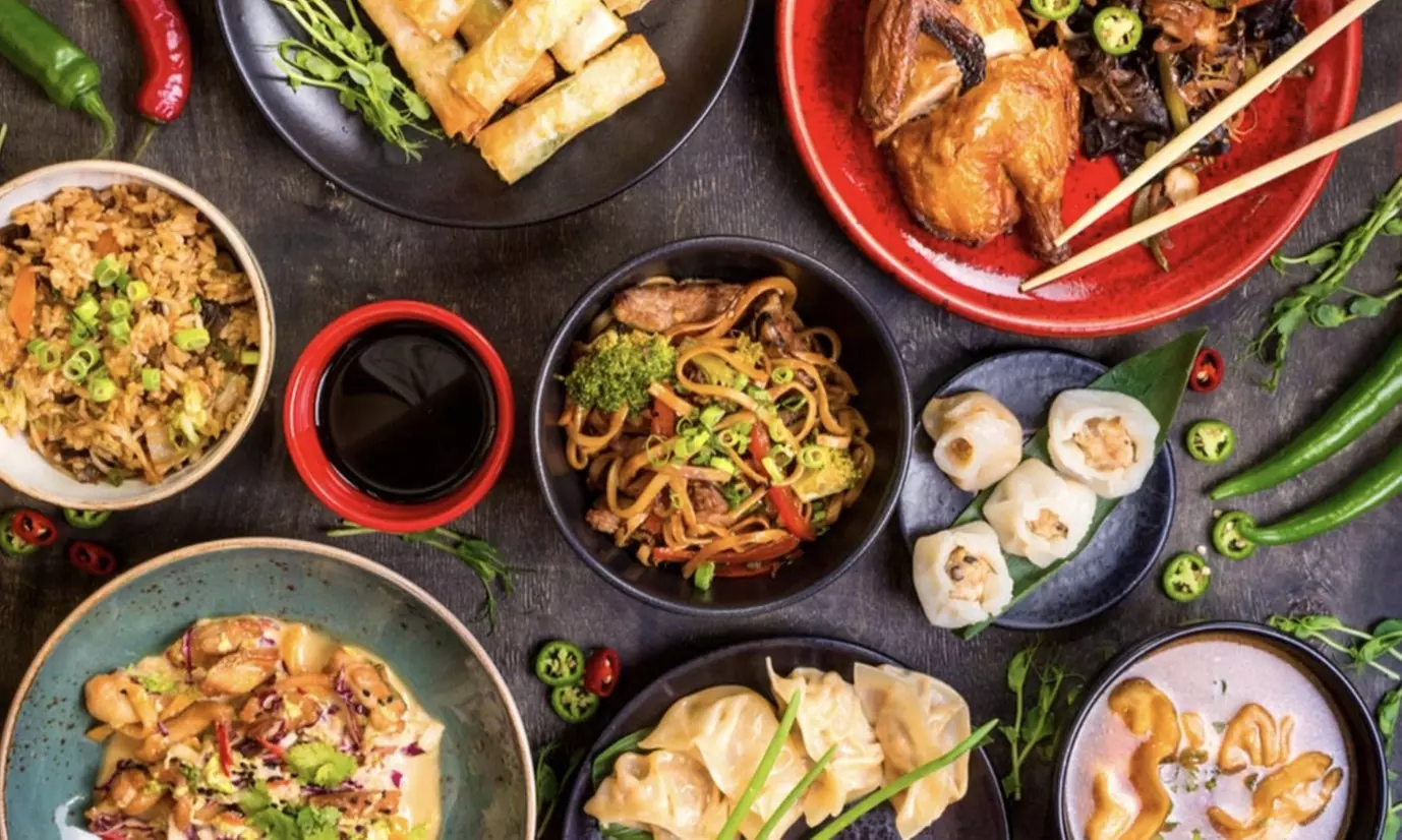 $26.99 for Family Meal with Two Soups, Two Entrees, Fried Rice, and Soda at So Good Kitchen ($34.92 Value) - Primary Image