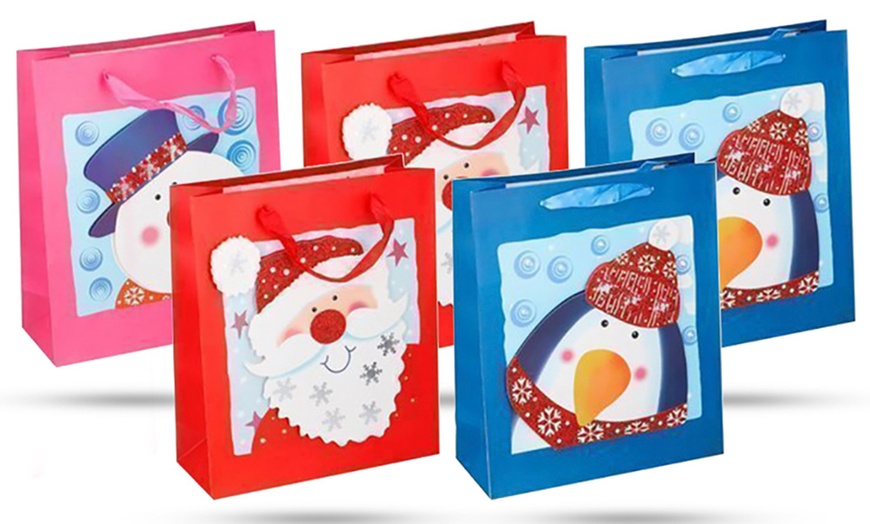 Image 10: Set de 5 sacs à cadeaux de Noël