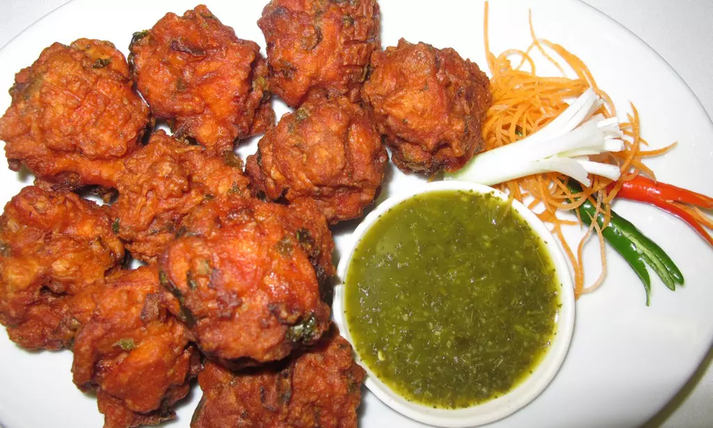 Asian Hakka Food & Drink at Asian Wok 'n' Roll - Millcreek Drive (Up to 40% Off). Two Options Available. - Primary Image