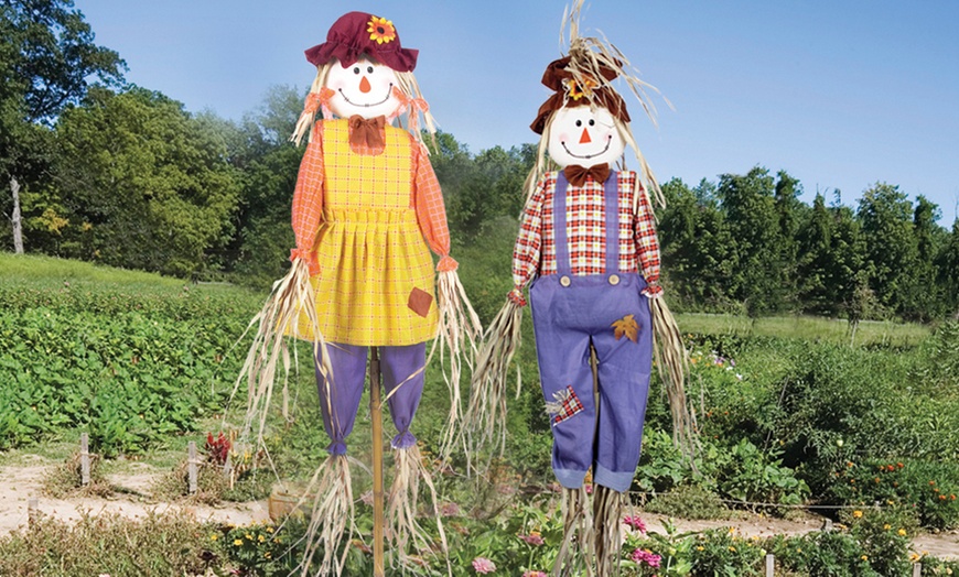 Image 1: Set of Two 1.83m Bamboo Pole Scarecrows