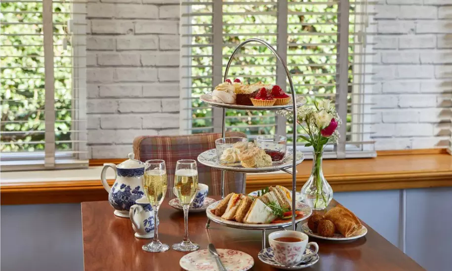 Up to 44% Off! Decadent Afternoon Tea for 2 or 4 with Optional Bubbles at The Grange Manor - Primary Image