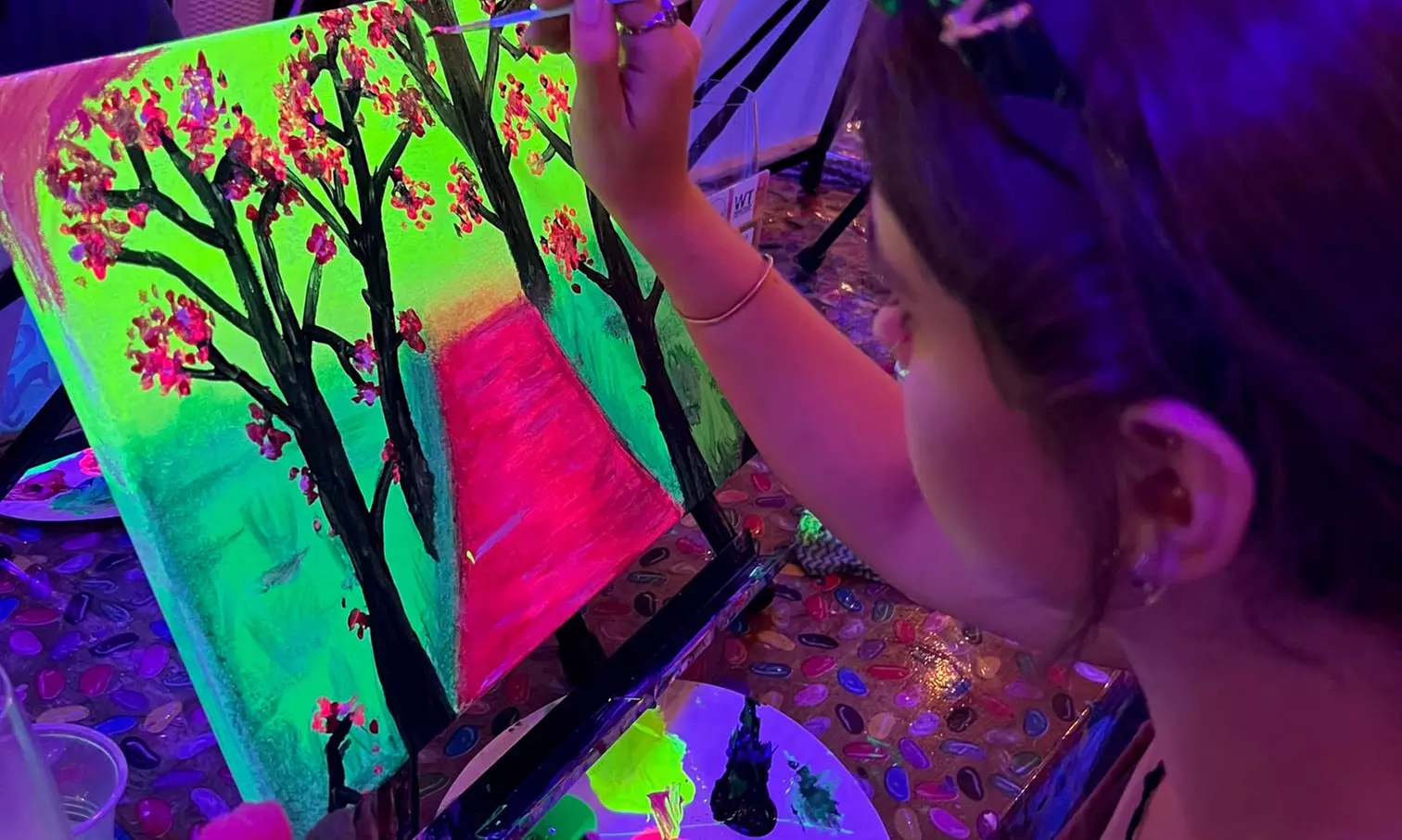 Up to 48% Off UV Glow Paint and Sip Sessions