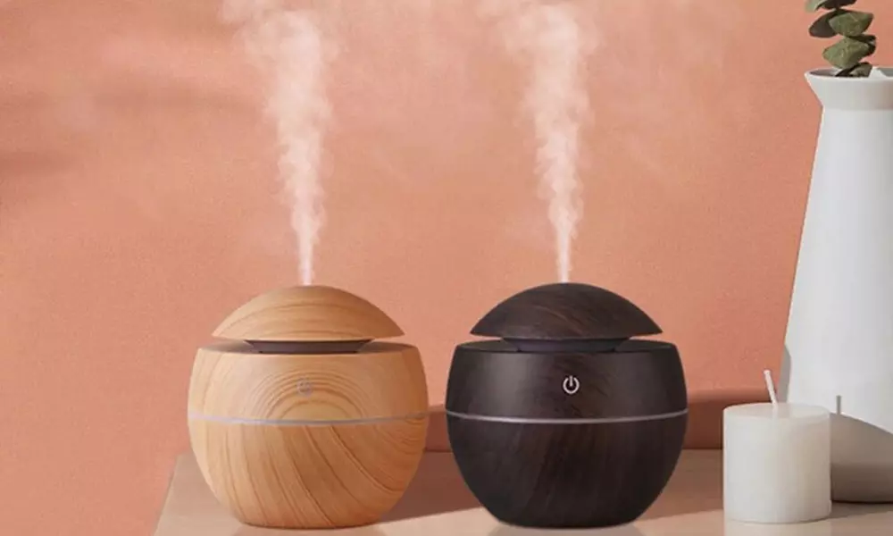 Mini-luchtbevochtiger en luchtreiniger inclusief led-verlichting in 4 verschillende kleuren - Primary Image