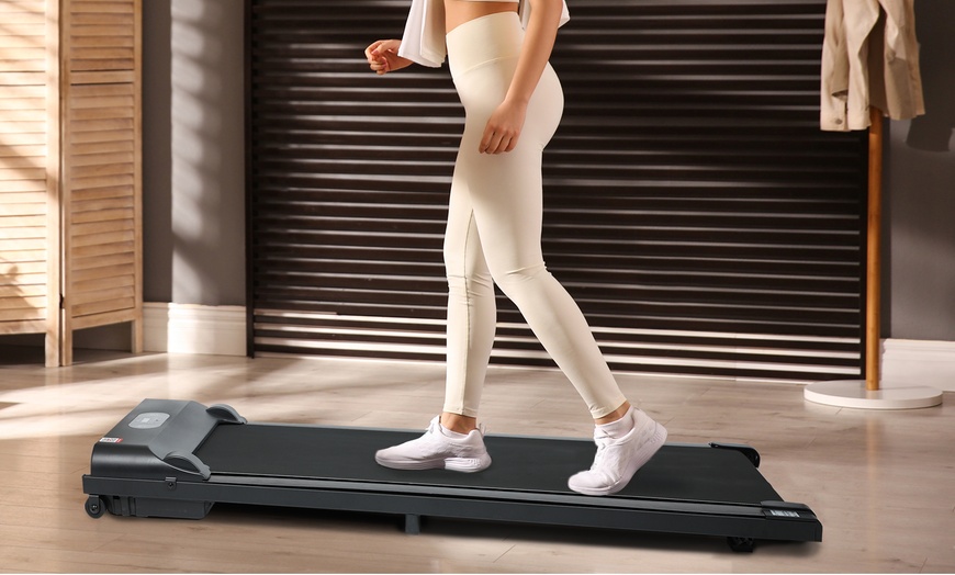 Image 1: Electric Walking Pad Treadmill with Adjustable Speeds and LCD Display