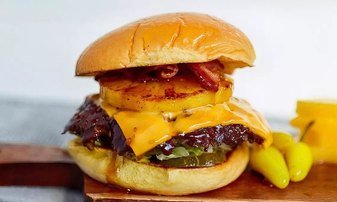 Savor Chicago-style Cuisine at Juicy J’s Burgers And Wings(Up to 30% Off) - Second Medium