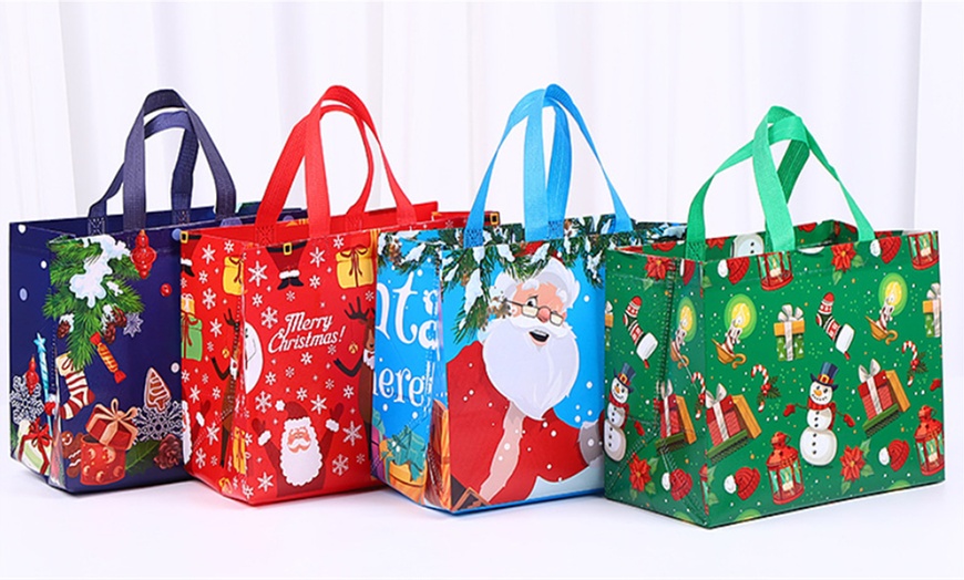 Image 1: 8 or 16 Christmas-Themed Non-Woven Bags