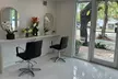 Brazilian Blowout Smoothing Treatment + Optional Haircut at Lux Hair Salon And Spa (Up to 55% Off) - Second Medium