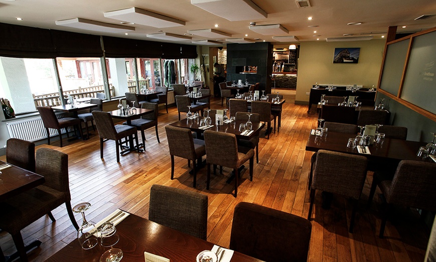 Image 6: Chateaubriand Dining with a Glass of Wine at Farndon Ferry