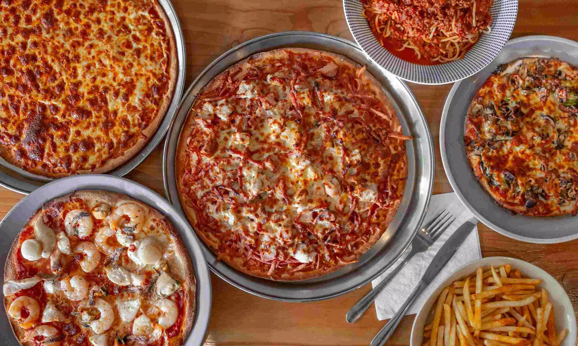 Savor Medium Pizzas or Pasta + Small Garlic Pizza
