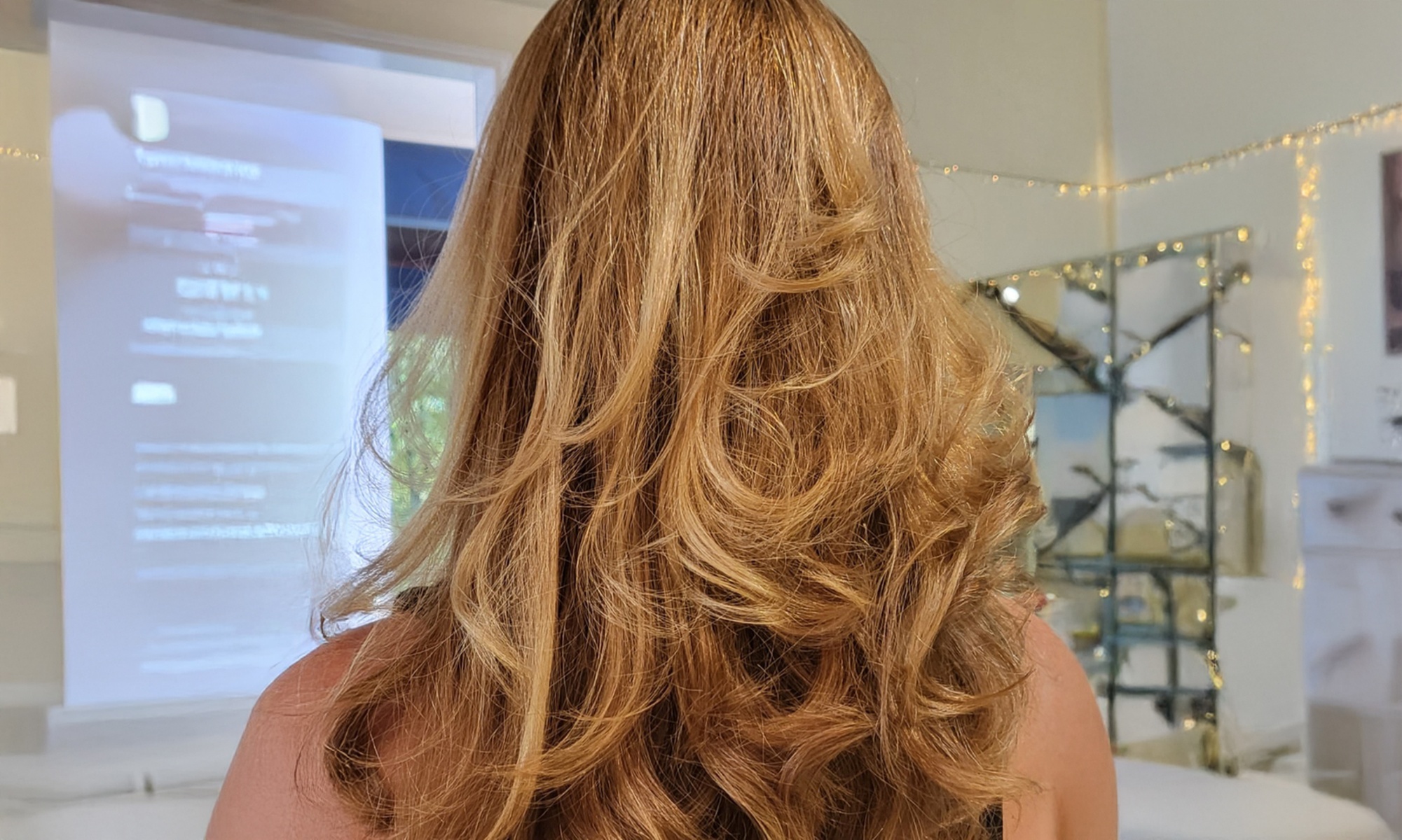 UP TO 82% Off on Haircut with Optional Single Process Color or Half/Full Highlights at Atelier Emi Hair Design