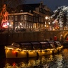 Image 4: Betoverende avondtocht vol licht, kunst en gezelligheid op het water