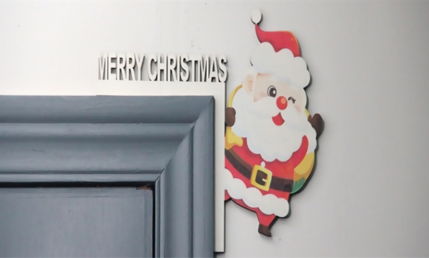 Image 3: One- or Six-Pack of Festive Wooden Door Frame Decorations