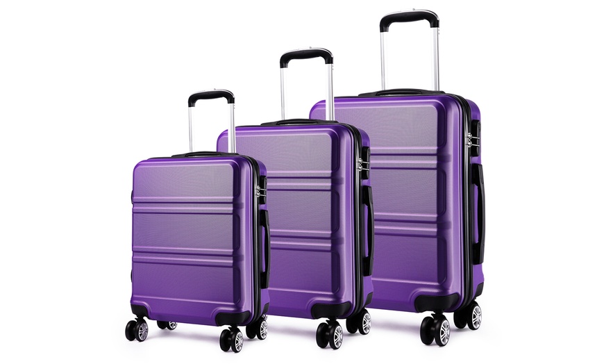 Image 13: One Piece or a Three - Piece Suitcase Ensemble