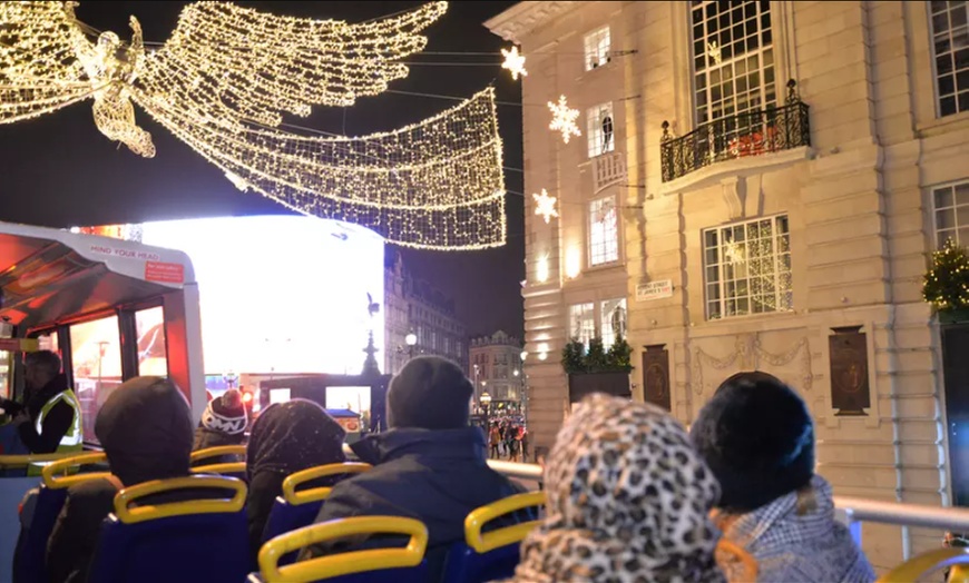 Image 1: Live Guided Christmas Lights Bus Tour for Child or Adult 