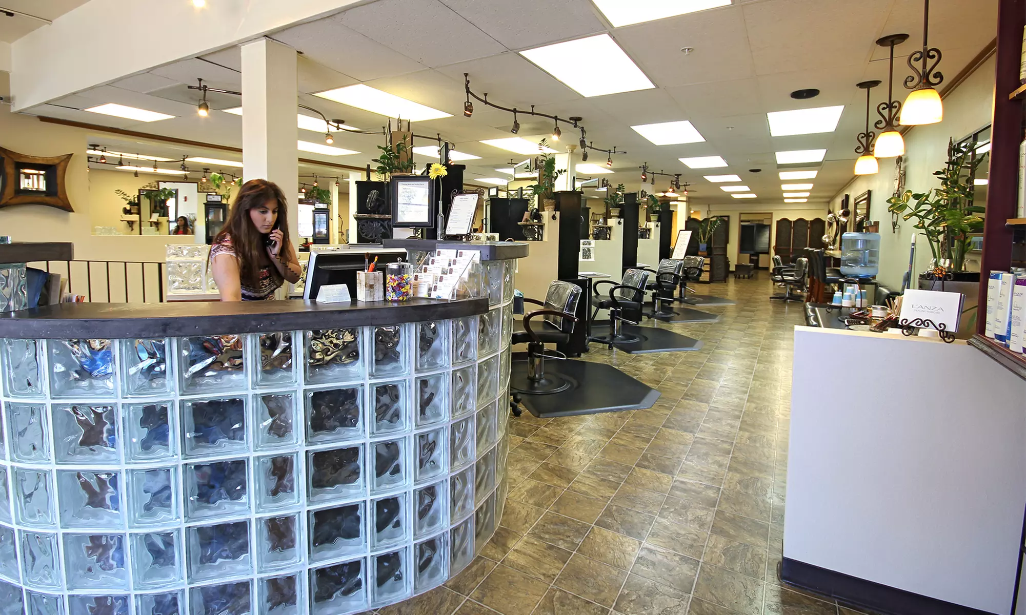 Haircut, Deep Conditioning, and Partial or Full Highlights at Visible Changes Salon and Day Spa (Up to 54% Off) - Primary Image