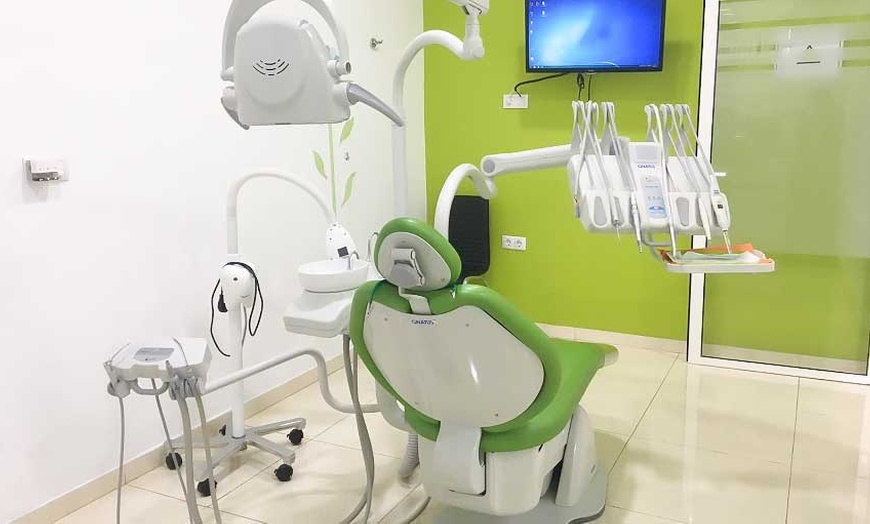 Image 1: Limpieza dental y curetaje