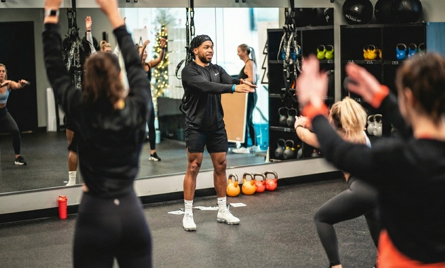 Image 3: Customized Fitness Programs for Strength & Definition