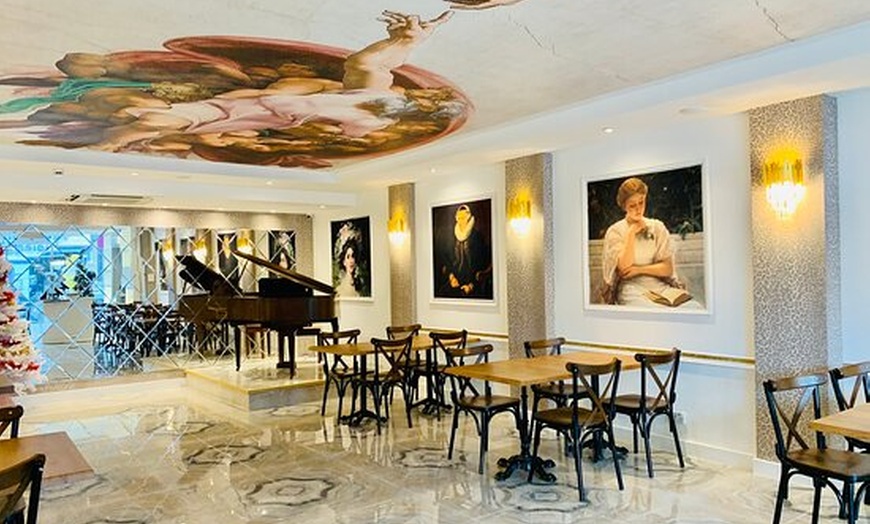 Image 1: Up to 47% Off on British Cuisine at Ratatouille Cafe Bar Restaurant