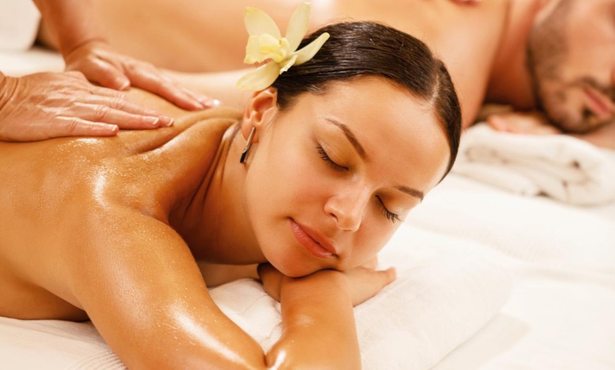 Image 1: Up to 61% Off on Couples Massage at SIMPLE PLEASURES MASSAGE & SPA